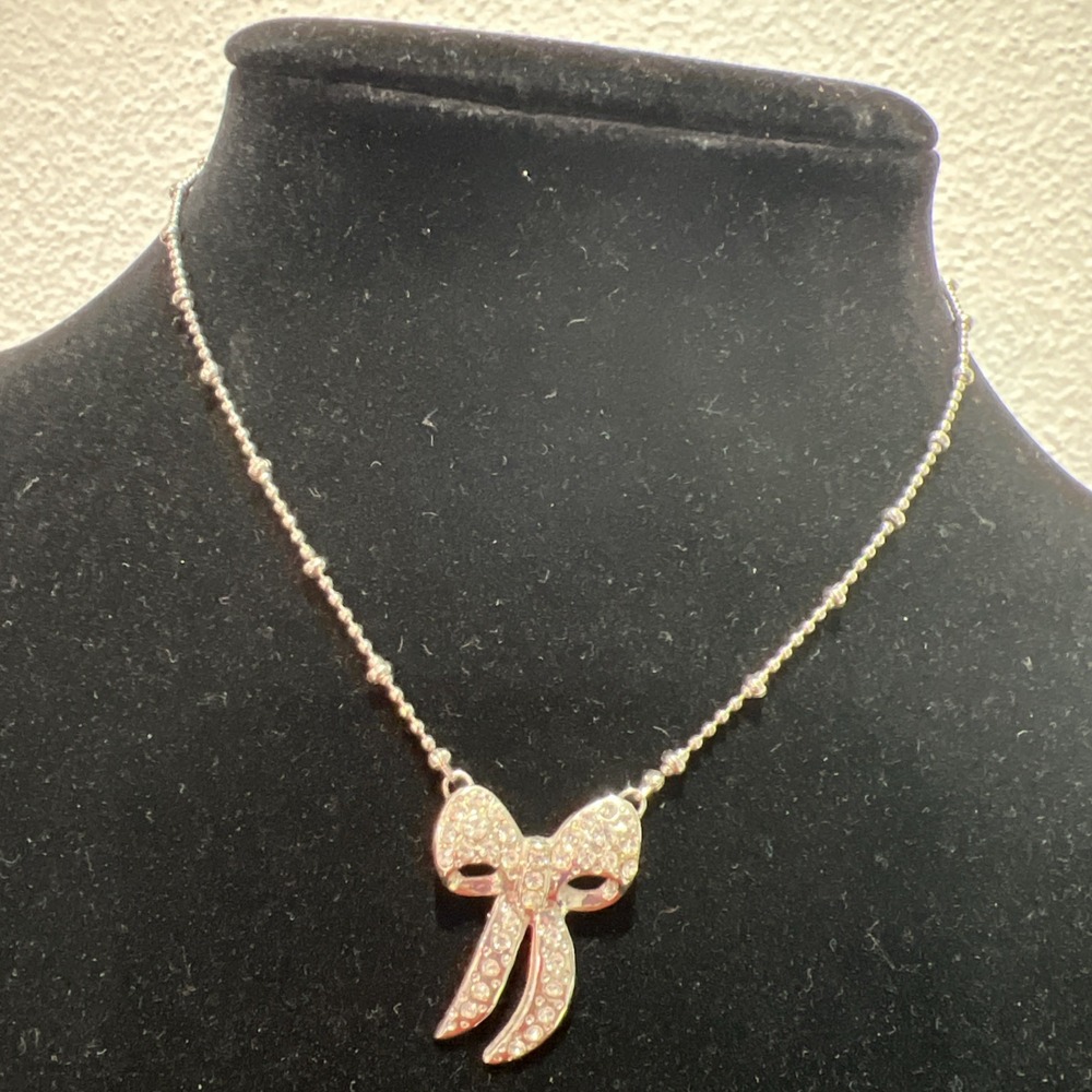 Cookie Lee Knot Rhinestone Silver Tone  18" Necklace